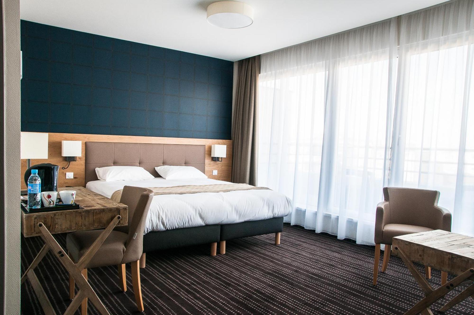 Le Lodge Brit Hotel Strasbourg Zenith Bagian luar foto